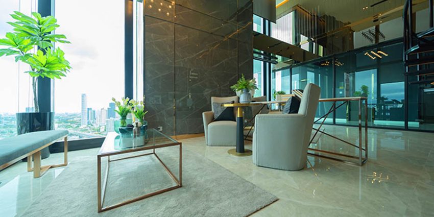 How a Well-Maintained Lobby Creates a Lasting First Impression for Clients; Inside of modern hotel lobby, entrance and reception, waiting area with urban city view of outdoor, indoor.